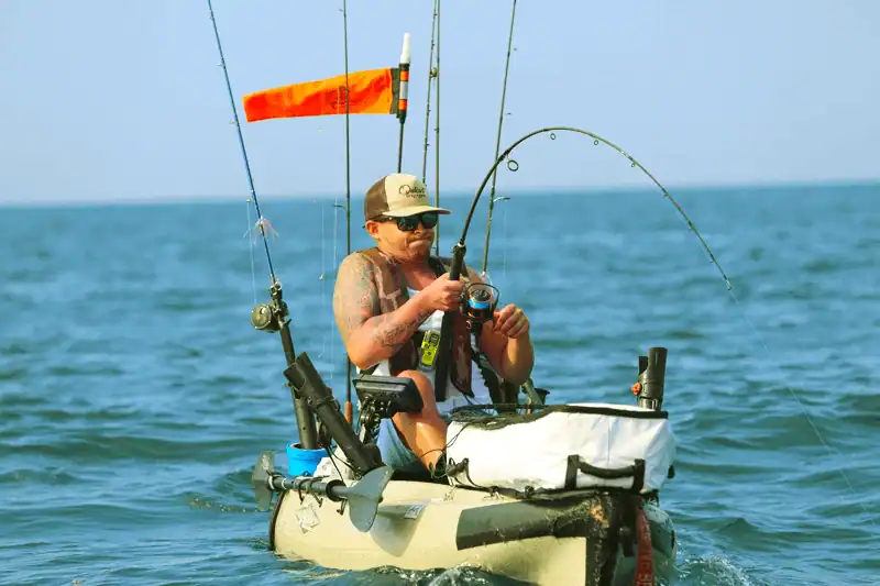 man-fishing-on-the-sea-fishing-gear-store man-fishing-on-the-sea-fishing-gear-store